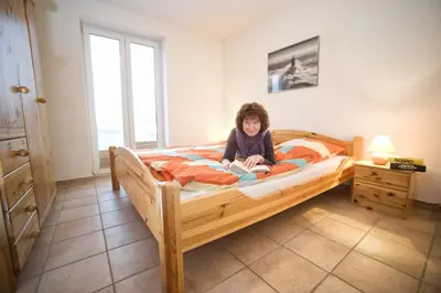 Ein Bett oder Betten in einem Zimmer der Unterkunft Ferienhaus Saltkrokan