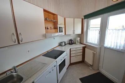 Küche/Küchenzeile in der Unterkunft Ferienhaus Hus am See