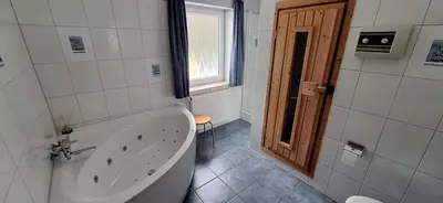 Ein Badezimmer in der Unterkunft Ferienhaus Strandmuschel