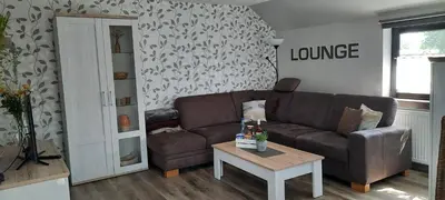 Ein Sitzbereich in der Unterkunft Ferienwohnung Schwiemann, Obergeschoss