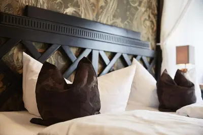 Ein Bett oder Betten in einem Zimmer der Unterkunft Aparthotel Bernstein