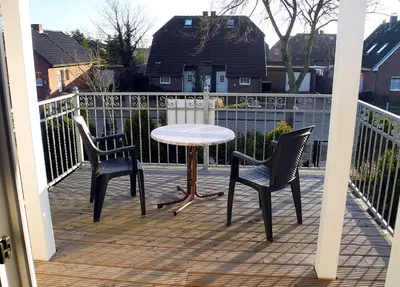 Ein Balkon oder eine Terrasse in der Unterkunft Ferienhaus Krabbe Friedrichskoog, 8 Personen, 3 bzw 4 Schlafzimmer