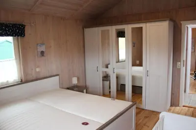 Ein Bett oder Betten in einem Zimmer der Unterkunft Ferienhaus Nordseebrise
