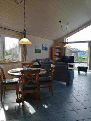 Ein Sitzbereich in der Unterkunft Ferienhaus Kormoran