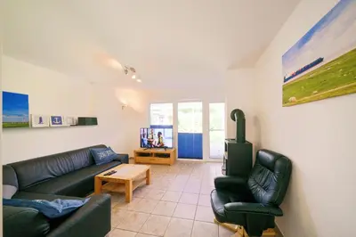 Ein Sitzbereich in der Unterkunft Ferienhaus Seestern I