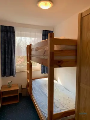 Ein Bett oder Betten in einem Zimmer der Unterkunft Residenz Thalassa Whg. 2