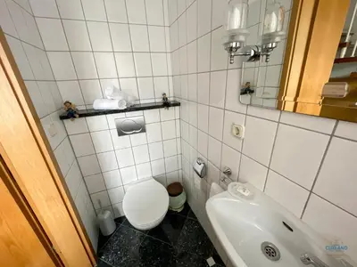 Ein Badezimmer in der Unterkunft Ferienhaus Alter Duhner Weg 7h