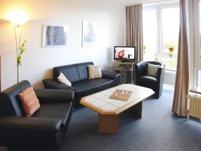 Ein Sitzbereich in der Unterkunft Ferienwohnung in Cuxhaven-Duhnen
