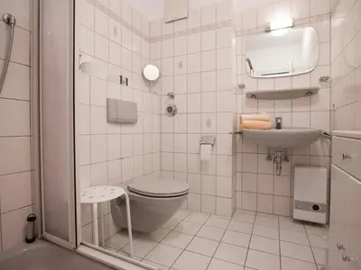 Ein Badezimmer in der Unterkunft Ferienwohnung in Cuxhaven-Duhnen