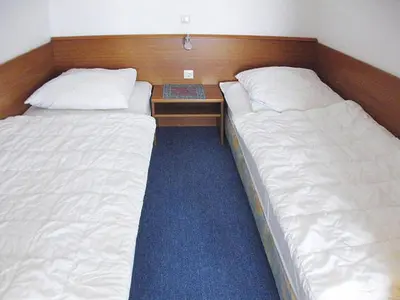 Ein Bett oder Betten in einem Zimmer der Unterkunft Ferienwohnung in Cuxhaven-Duhnen