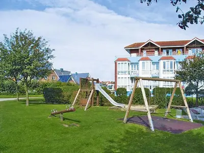 Ein Kinderspielbereich in der Unterkunft Ferienwohnung in Cuxhaven-Duhnen
