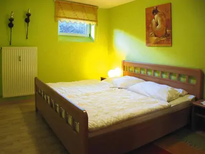 Ein Bett oder Betten in einem Zimmer der Unterkunft Ferienwohnung in Cuxhaven-Duhnen