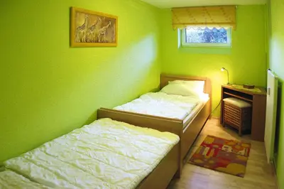 Ein Bett oder Betten in einem Zimmer der Unterkunft Wohnung in Cuxhaven mit einem gemeinsamen Pool