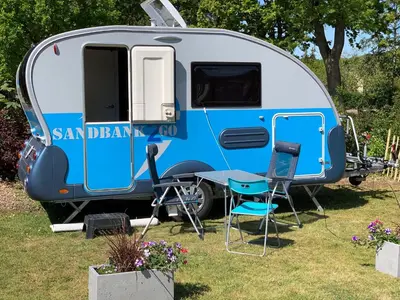 Ein Garten an der Unterkunft Sandbank2go