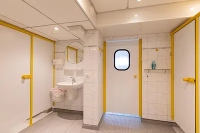 Ein Badezimmer in der Unterkunft Knechtsand 406