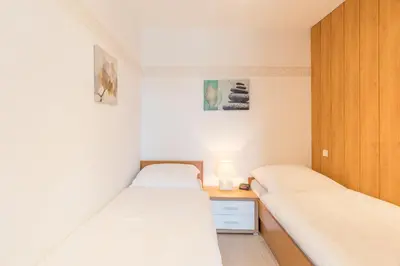Ein Bett oder Betten in einem Zimmer der Unterkunft Knechtsand 406