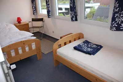 Ein Bett oder Betten in einem Zimmer der Unterkunft Am Ringwall 102