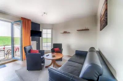 Ein Sitzbereich in der Unterkunft Dünenglück, Ferienwohnung 12
