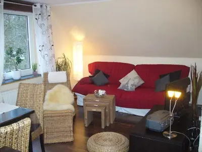 Ein Sitzbereich in der Unterkunft Voßhörn 27, Ferienwohnung 4