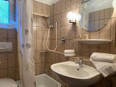 Ein Badezimmer in der Unterkunft Haus Dwarslöper, Ferienwohnung 3