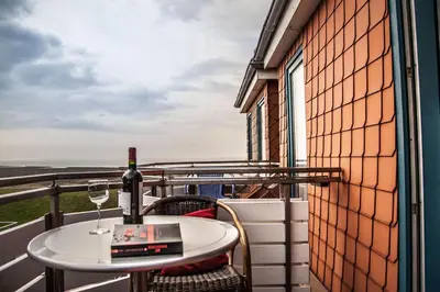 Ein Balkon oder eine Terrasse in der Unterkunft Dünenglück, Ferienwohnung 33
