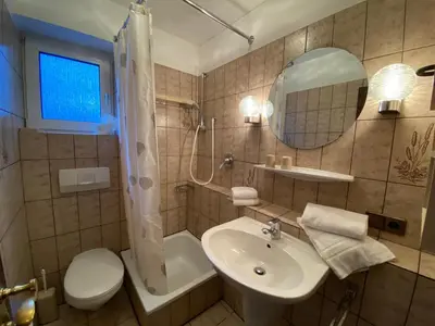 Ein Badezimmer in der Unterkunft Haus Dwarslöper, Ferienwohnung 1