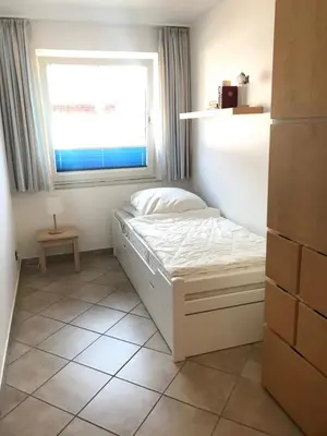 Ein Bett oder Betten in einem Zimmer der Unterkunft Am grooten Steen 1, Ferienwohnung 12