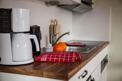 Küche/Küchenzeile in der Unterkunft Dünenglück, Ferienwohnung 13