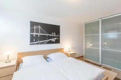Ein Bett oder Betten in einem Zimmer der Unterkunft Rugenbargsweg 65