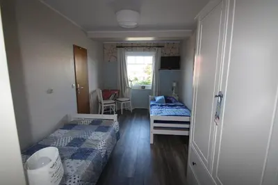 Ein Bett oder Betten in einem Zimmer der Unterkunft Armarova Ihre Ferienpension
