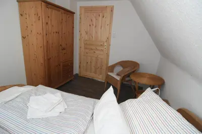 Ein Bett oder Betten in einem Zimmer der Unterkunft Ferienhaus kleine Villa