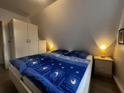Ein Bett oder Betten in einem Zimmer der Unterkunft Am Ringwall 22
