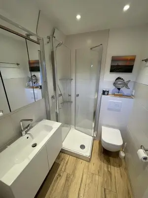 Ein Badezimmer in der Unterkunft Kampweg 26