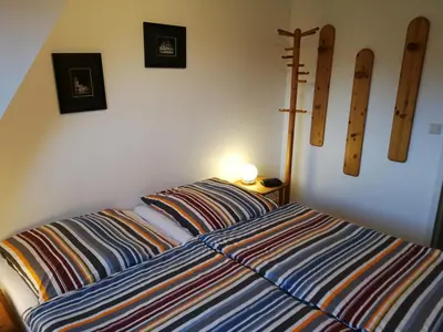 Ein Bett oder Betten in einem Zimmer der Unterkunft Scharhörn, Ferienwohnung 14