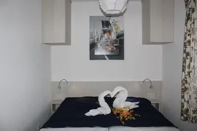 Ein Bett oder Betten in einem Zimmer der Unterkunft Haus Seehund 16