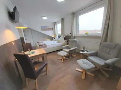 Ein Sitzbereich in der Unterkunft Appartment Vermietung Lütje