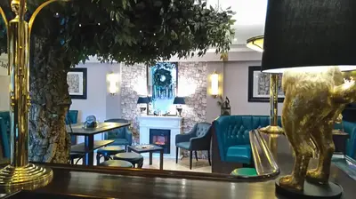 Ein Sitzbereich in der Unterkunft Hotel am Hasengarten