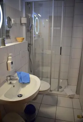 Ein Badezimmer in der Unterkunft Hotel Haus am Meer