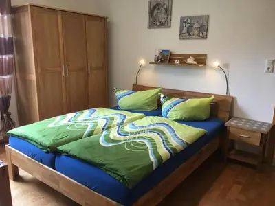 Ein Bett oder Betten in einem Zimmer der Unterkunft Hotel Haus am Meer