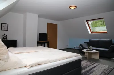 Ein Bett oder Betten in einem Zimmer der Unterkunft Ferienwohnung am Schwarzen Wehl