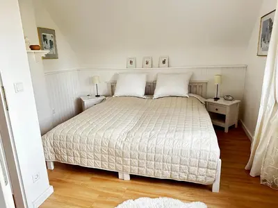 Ein Bett oder Betten in einem Zimmer der Unterkunft Haus Wexler 5 - OG