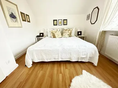 Ein Bett oder Betten in einem Zimmer der Unterkunft Haus Wexler 5 - OG