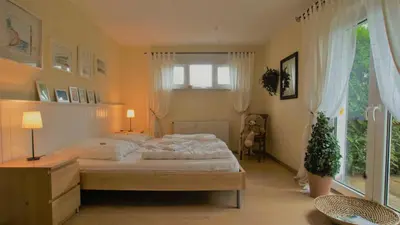 Ein Bett oder Betten in einem Zimmer der Unterkunft Haus Wexler 6 - EG