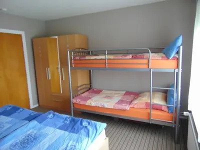 Ein Bett oder Betten in einem Zimmer der Unterkunft Ferienwohnung Ehrich nahe Otterndorf