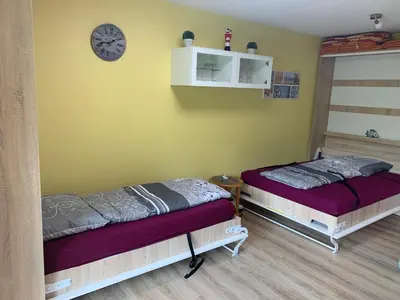 Ein Bett oder Betten in einem Zimmer der Unterkunft Lilli-Marleen 1-23 Wurster-Nordsee-Küste