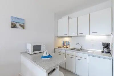 Küche/Küchenzeile in der Unterkunft Baltic - Wohnung 24