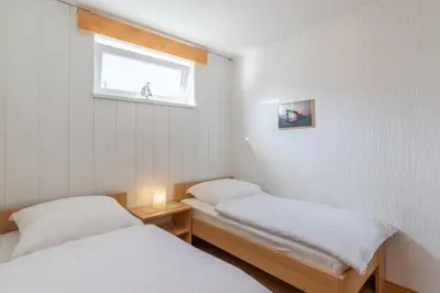 Ein Bett oder Betten in einem Zimmer der Unterkunft Baltic - Wohnung 24