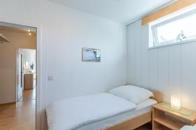 Ein Bett oder Betten in einem Zimmer der Unterkunft Baltic - Wohnung 24