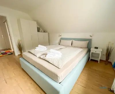 Ein Bett oder Betten in einem Zimmer der Unterkunft Urlaub in der Grimmershörnbucht
