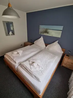 Ein Bett oder Betten in einem Zimmer der Unterkunft Gorch Fock 08